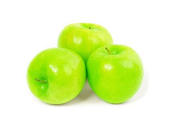 Fresh green apples on white background