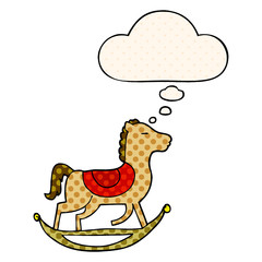 cartoon rocking horse and thought bubble in comic book style