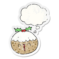 cute cartoon christmas pudding and thought bubble as a distressed worn sticker