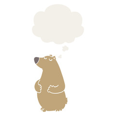 cartoon bear and thought bubble in retro style