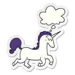 cartoon unicorn and thought bubble as a printed sticker