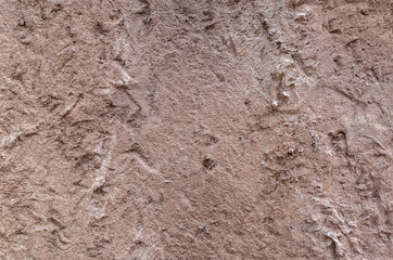 rough stone wall in brown color