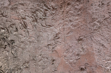 rough stone wall in brown color