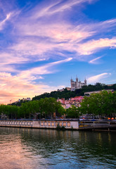 Naklejka premium Lyon, France and the Basilica of Notre-Dame de Fourvière at sunset.