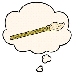 cartoon paint brush and thought bubble in comic book style