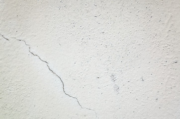 cracked and aged gray wall background