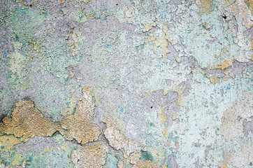 Obraz na płótnie Canvas wall with colorful dirty cracked texture