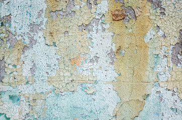 mur avec une texture fissurée sale colorée