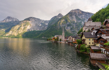 Panoramic lake with mountain and Hallstatt village in summer, famous landmark and travel destination in Austria
