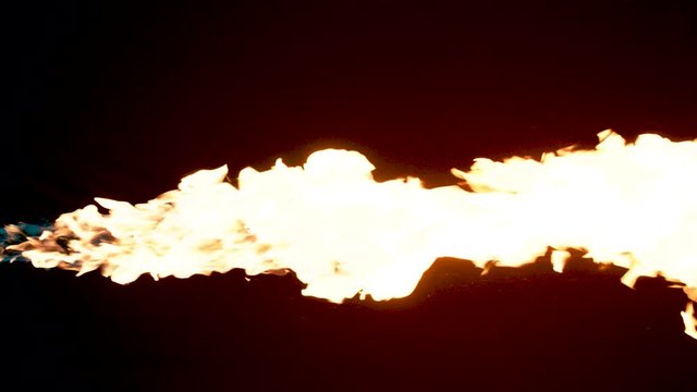 Slow motion flamethrower on black background