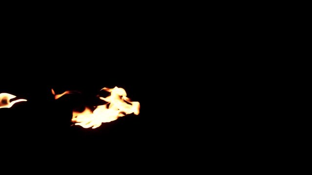 Slow motion flamethrower on black background