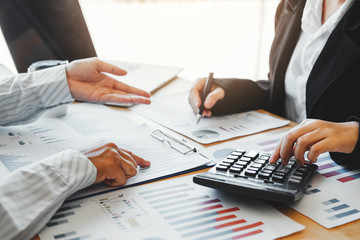 Naklejka premium Business team meeting Strategy Planning with new startup project plan Finance and Economy Graph with laptop successful teamwork