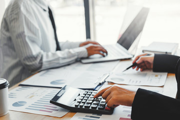 Business team meeting Strategy Planning with new startup project plan Finance and Economy Graph with laptop successful teamwork