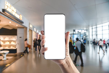 Mobile phone in hand at Airport