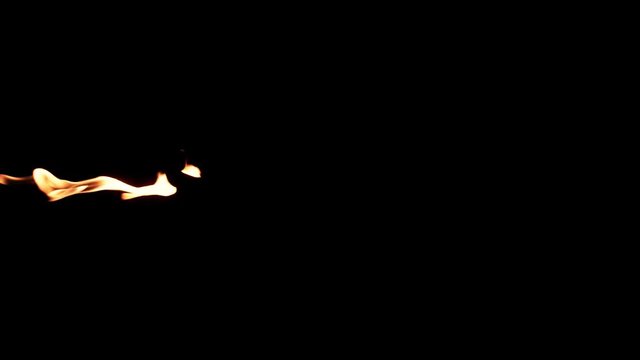 Slow motion flamethrower on black background