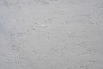 Close up texture of grey color painting on plywood wall.