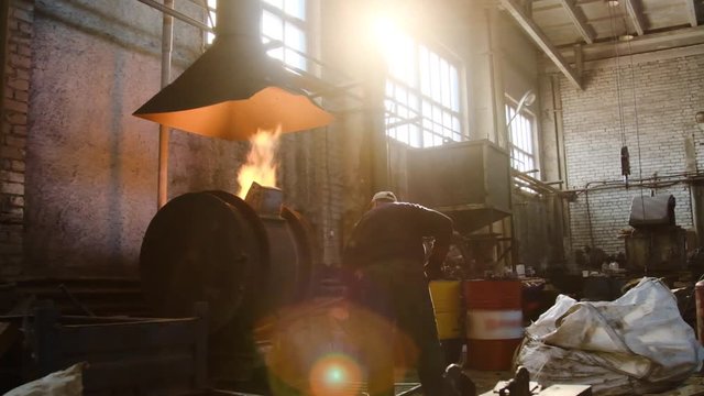 Aluminium master alloys production. Stock footage. The master works at the foundry