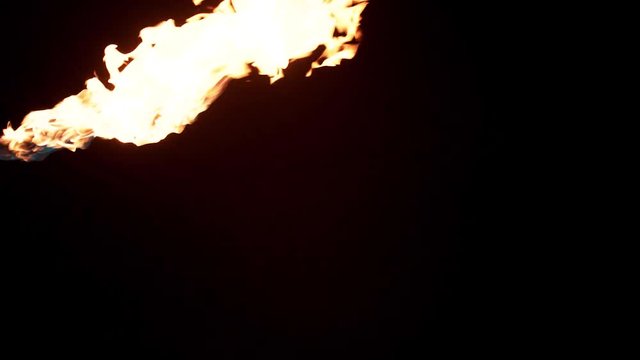 Slow motion flamethrower on black background
