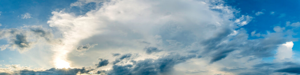 Obraz premium Dramatic panorama sky with cloud on sunrise and sunset time. Panoramic image.