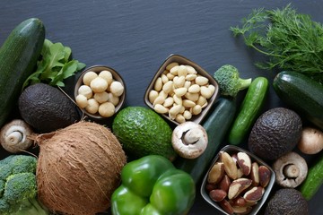 Ketogenic Diet. Vegetables and nuts for low carb diet. Set of green vegetables and nuts for keto nutrition.Healthy eating. 