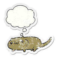 cartoon cat and thought bubble as a distressed worn sticker