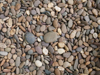 brown stone background, pebble beach