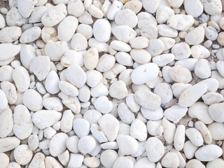 white stone background, closeup beauty pebble beach stone