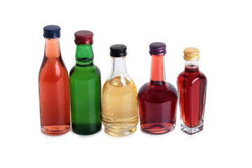 Glass bottle whit wine on a white background