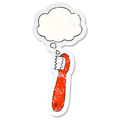 cartoon toothbrush and thought bubble as a distressed worn sticker