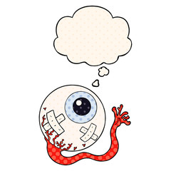 cartoon injured eyeball and thought bubble in comic book style