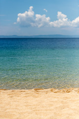 Summer beach background. Sand, sea and sky
