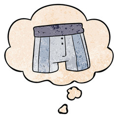cartoon boxer shorts and thought bubble in grunge texture pattern style