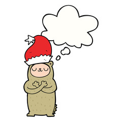 cartoon bear wearing christmas hat and thought bubble