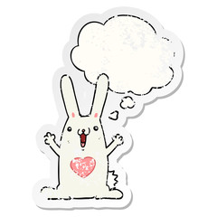 cartoon rabbit in love and thought bubble as a distressed worn sticker