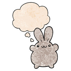 cartoon rabbit and thought bubble in grunge texture pattern style
