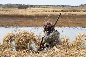 duck hunter sitting thinking while hunting