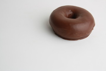 chocolate bagel on white background