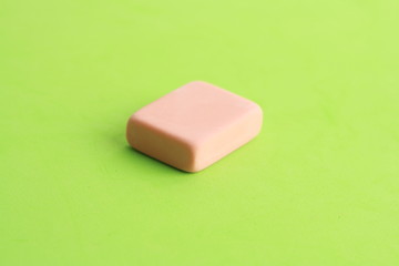 pink eraser on colorful background