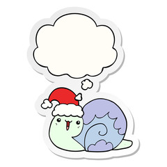 cute cartoon christmas snail and thought bubble as a printed sticker