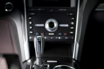 Fototapeta na wymiar Automatic transmission lever - suv car interior comfortable drive