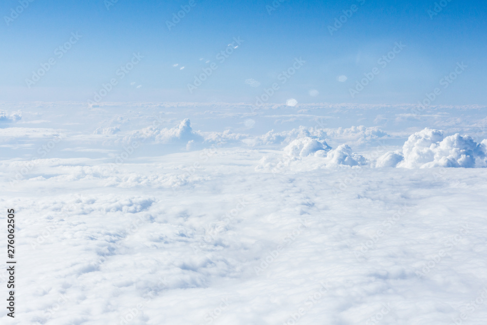 Wall mural clouds and sky from airplane window view