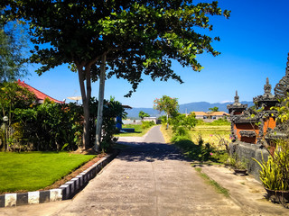 Natural Scenery Small Beach Road In Warm Sunshine On A Sunny Day The Village, Seririt, North Bali, Indonesia