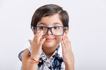 Cute indian little girl wearing spectacles