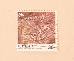 Fototapeta na wymiar AUSTRALIA - CIRCA 1970: A stamp printed in Australia shows the first australian rock paintings, circa 1970