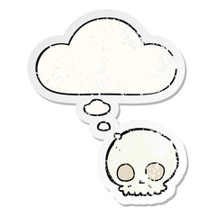 cartoon skull and thought bubble as a distressed worn sticker