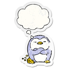 cartoon penguin tapping foot and thought bubble as a distressed worn sticker