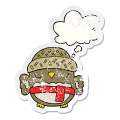 cute cartoon owl in hat and thought bubble as a distressed worn sticker