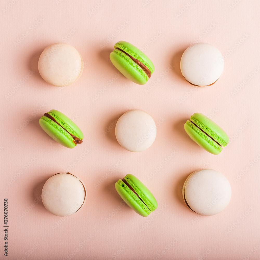 Wall mural macaron cake tender on a light background