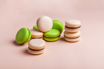 Macaron cake tender on a light background