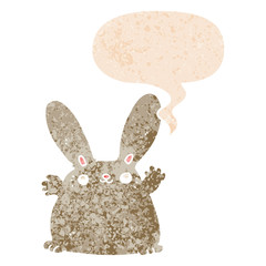 cartoon rabbit and speech bubble in retro textured style